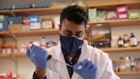 Kieran Adam prepares samples for Mor Lab